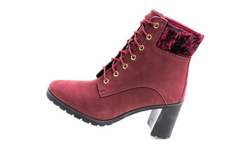 Fashionable women's demi-season ankle boots in cherry are on a white background.