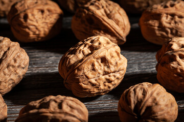 Wall Mural - walnuts group on wood background