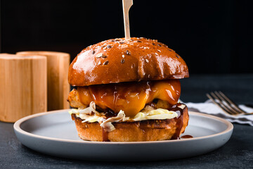 Poster - American food chicken burger with cabbage, cheddar cheese and barbecue sauce.