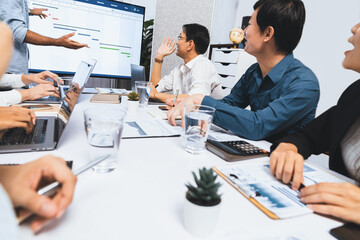 Aufkleber - Project manager communicate and collaborate with team using project management software display on monitor, tracking progress of project task and making schedule plan at meeting table. Prudent
