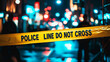 © GustavsMD - Yellow 'Police Line Do Not Cross' tape cordons off a nighttime crime scene with blurred city lights in the background, creating a tense atmosphere.