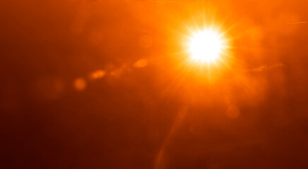 sunlight special lens flare light effect. shining sun at clear yellow golden sky with empty copy spa