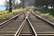 © Maxim Chuev - Railway station junctions. 2 Two railway tracks merge together. Rail way track along Black Sea with switch and interchange. empty railroad fork. wooden sleepers. Batumi, Georgia.