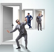 © Elnur - Businessman in uncertainty concept with many doors