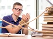 © Elnur - Young student forced to study tied