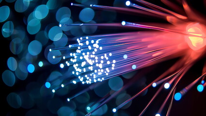 a bundle of fiber optic cables glowing with colorful light.