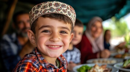 Wall Mural - Happy young boy wearing a patterned cap smiling at the camera