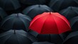 © lemoncraft - Red Umbrella Amidst a Sea of Black