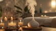 © kimly - a serene spa setting with a diffuser emitting essential oils and candles placed around a relaxing massage table.