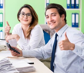 Poster - Two financial specialists working in the office