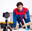 © Elnur - Young contractor recording video for his blog