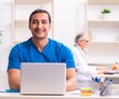© Elnur - Two male doctors working in the clinic