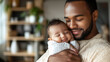 © Antto-AI - A black man father smiles warmly while holding his sleeping baby close, capturing a tender and joyful moment