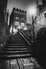 Sticker - Stone Steps Leading Up To A Medieval Building At Night