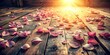 © AK2478 - whimsical vintage romantic dusty rose petals scattered on distressed wooden floorboards morning light warm tone film grain texture