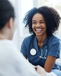 © Adobe Contributor - Smiling Black Female Doctor Talking With Patient