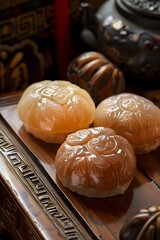 Closeup of Three Chinese Traditional Cakes on Wooden Tray