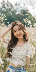 Smiling Asian Woman in a Field of Flowers