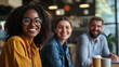 © Dirk - copy space, stockphoto, multiracial casual coworkers taking a coffee break, informal office setting. People with different origin, ethnic background taking a coffee pause. Difference, inclusive theme.