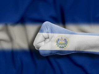 Fist of EL Salvador Flag Painted, Flag Painted On Hand, Multi Purpose concept Isolated on EL Salvador Background