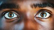 © Darunee - Pair of eyes looking directly into the camera, conveying emotion and intensity