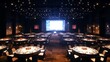 © Aris Suwanmalee - A large, empty conference hall with round tables and chairs set up for a formal event. A large screen hangs at the front.