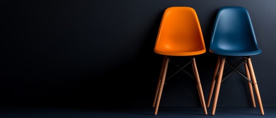 Canvas Print -  Two chairs situated adjacent to one another on a blue-orange floor against a wall