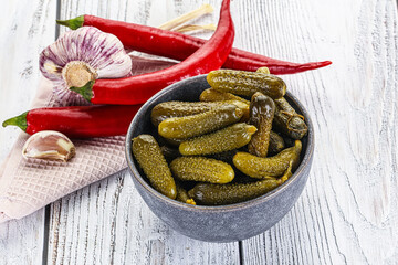 Canvas Print - Marinated small cucumbers in the bowl