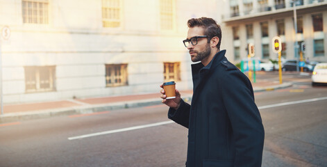 Canvas Print - Business man, coffee and walking in city for travel to work, lunch break and morning journey on sidewalk. Corporate lawyer, latte and commute in urban downtown or schedule in London with glasses