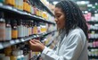 © TheGoldTiger - Female pharmacist is examining medication bottles on shelves in a pharmacy, focusing intently on the labels and contents