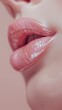 © liliyabatyrova - A woman's lips are painted with a bright pink lip gloss