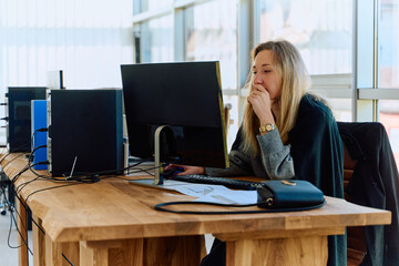 Businesswoman Programming a Product Design for Wood Processing Machine in Modern Office