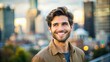 © Four888 - A happy and confident young man with a bright and infectious smile, standing against a blurred city background, exuding warmth and friendliness.