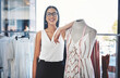 © Frank Coop/peopleimages.com - Happy woman, portrait and fashion designer with mannequin in confidence for small business at boutique. Young, female person or tailor with smile or measuring tape for garment or clothing production