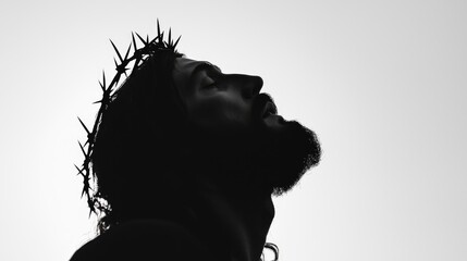 Silhouette of Jesus Wearing Crown of Thorns in Contemplation