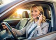 © Four888 - Professional woman driving car while engaged in phone call, discussing work projects, client updates, and job tasks during daily commute to office, balancing work and life.
