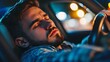 © Grand - Exhausted Man Sleeping on Steering Wheel in Car