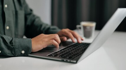Poster - person typing on a laptop, symbolizing productivity, work, and the integration of technology in daily tasks.