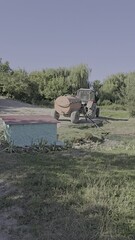 Wall Mural - A tractor in a field