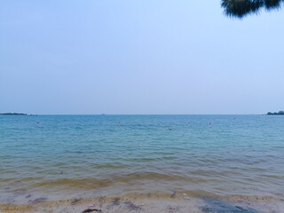 Wall Mural - Nature landscape view of beautiful tropical beach and sea in sunny day