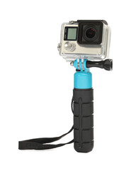 Wall Mural - Modern action camera and monopod isolated on white