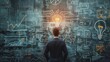 © kinara art design - A businessman stands in front of a chalkboard covered in drawings, looking at a light bulb representing a new idea.