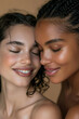 © kristina - Close-up portrait of two diverse women, Caucasian and African-American, sharing a tender moment