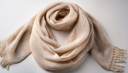 A light-colored woven scarf displayed on a blank backdrop.