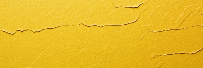 Bright yellow textured wall with peeling paint showcasing an aged appearance