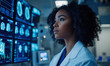 © Claudia Nass - dark skinned doctor analyzing medical imaging scans