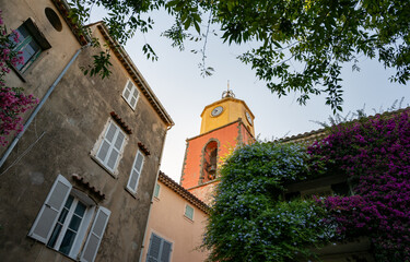 Walking in Saint-Tropez famous touristic village on French Riviera, summer vacation, colorful houses, Var, Provence, France