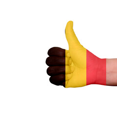 thumbs up painted with belgium flag colors isolated on white background