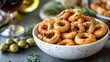 © Generative AI - Taralli with red wine in a white bowl Vegan aperitif Glass of wine olive oil and green olives in the background : Generative AI