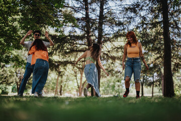 Wall Mural - Group of young teenagers playing and enjoying themselves in a park, highlighting friendship, joy, and moments of laughter and happiness.